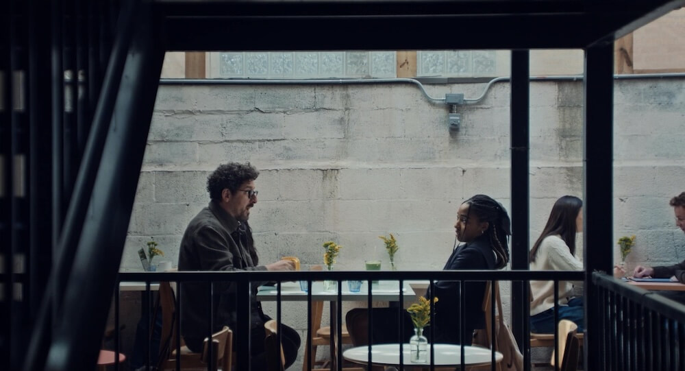 Andrew highlights the significance of shooting the exterior of a restaurant for once, featuring Ayo Edebiri and Adam Shapiro